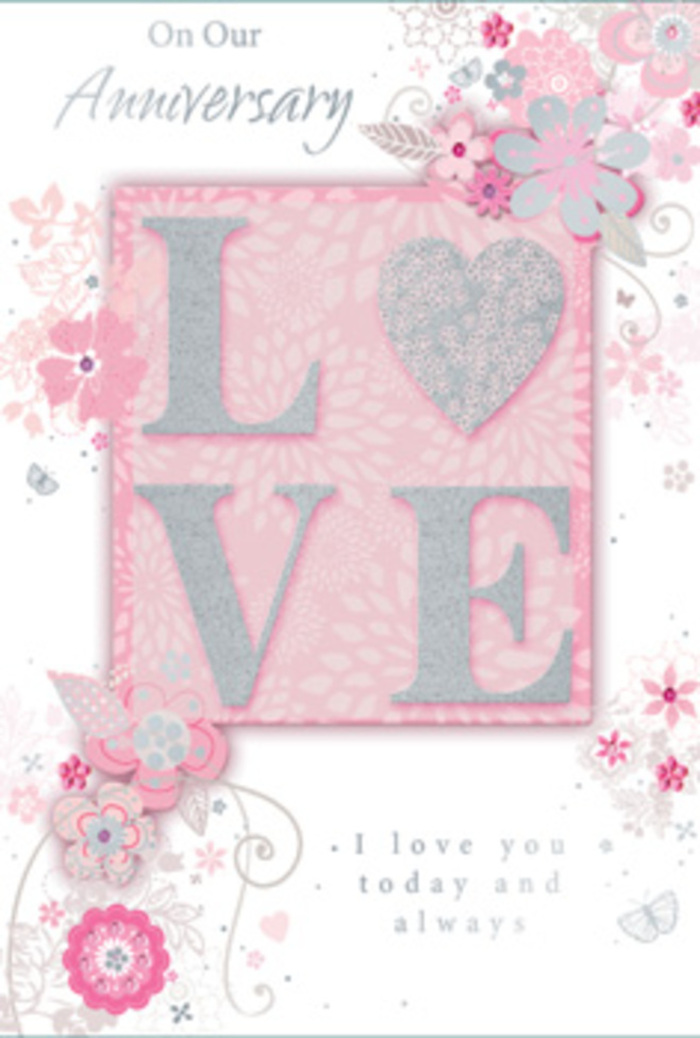 The anniversary card pictured here seems to capture the atmosphere of a quiet, love-filled evening in Bromley Common, translated into blush tones and delicate glimmers of silver. Its main motif is the word LOVE, standing centrally in raised, glitter-trimmed letters. Each letter forms a neat block with gently rounded edges, dusted with fine, pale glitter that shifts between pink and silver as if reflecting soft candlelight. The embossing is clearly visible, suggesting a satisfyingly tactile surface under the fingertips, like the gentle rise and fall of ruffled petals. This word rests on a blush rectangle that subtly contrasts with the lighter pink background, adding depth and drawing the eye to the heart of the design. Flowing around and beyond it, an intricate pattern of stylised flowers, leaves, and curling tendrils spreads across the card. The flowers, though illustrated rather than photographic, evoke real blooms through their delicate shading: blush pink petals edged in white, pale grey accents, and gentle silver touches that bring a subtle metallic sheen. These botanical lines curve and swirl with the same rhythm a florist might use when arranging stems in a hand-tied anniversary bouquet for delivery along Homesdale Road or near the playing fields. The background itself is a soft, velvety pink that gently lightens toward the centre, creating a halo effect around the floral pattern. Nestled within this composition, a flowing script in quiet grey ink shares a heartfelt anniversary message, its calligraphic style mirroring the movement of the vines. Together, the textures, colours, and motifs convey trust, tenderness, and time-an enduring celebration of partnership, much like a favourite bouquet lovingly reordered year after year in BR2.